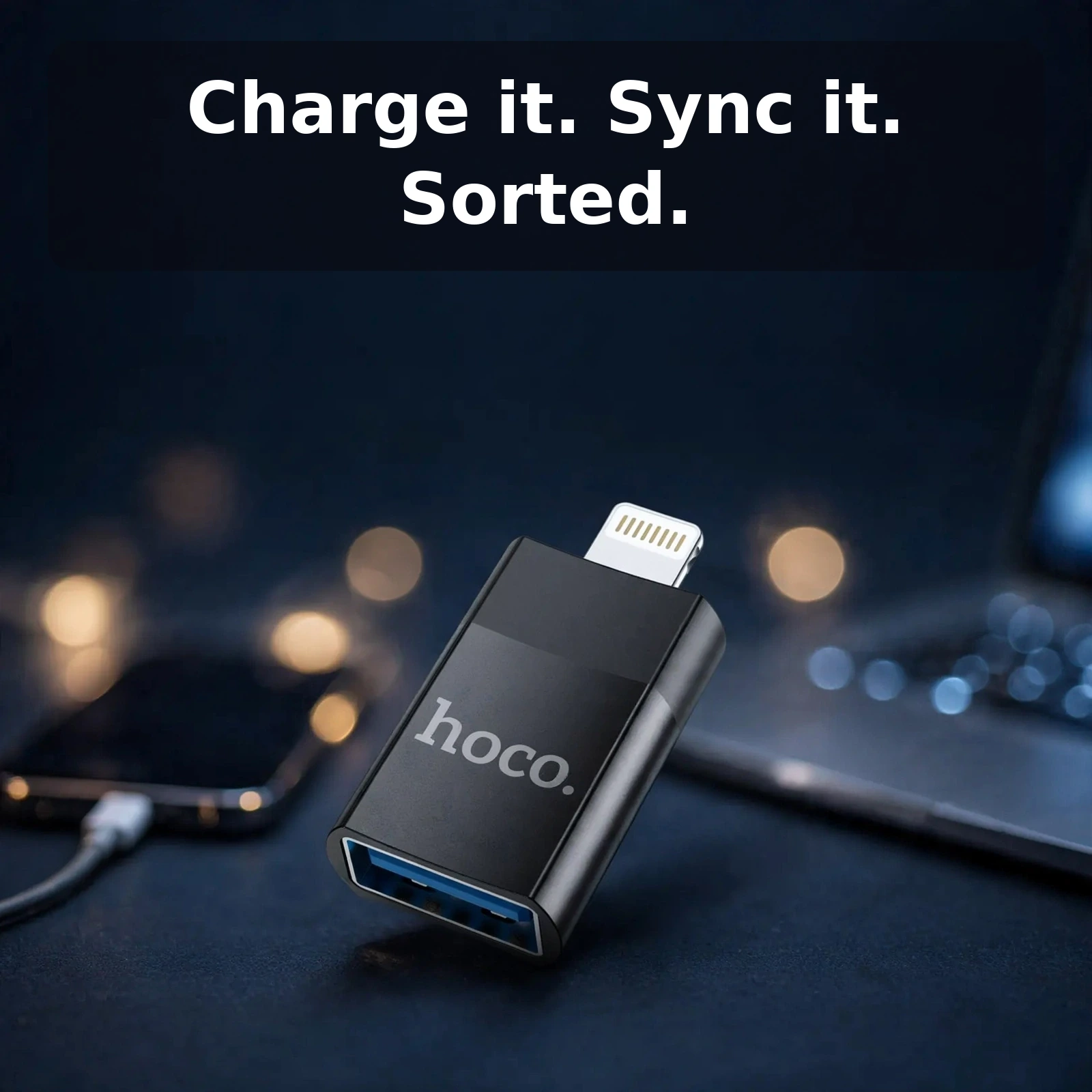 Hoco UA17 Lightning to USB adapter studio product shot with phone and laptop context for charging and syncing