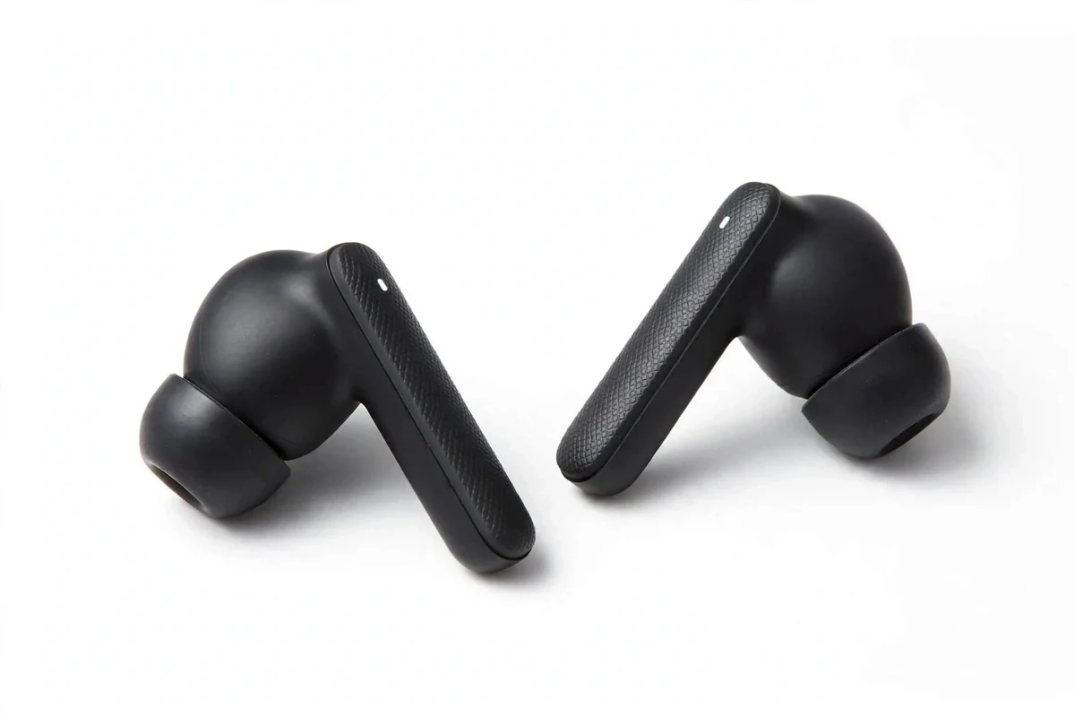 Pair of black QCY Buds QT43 wireless earbuds side by side, angled, on a white background
