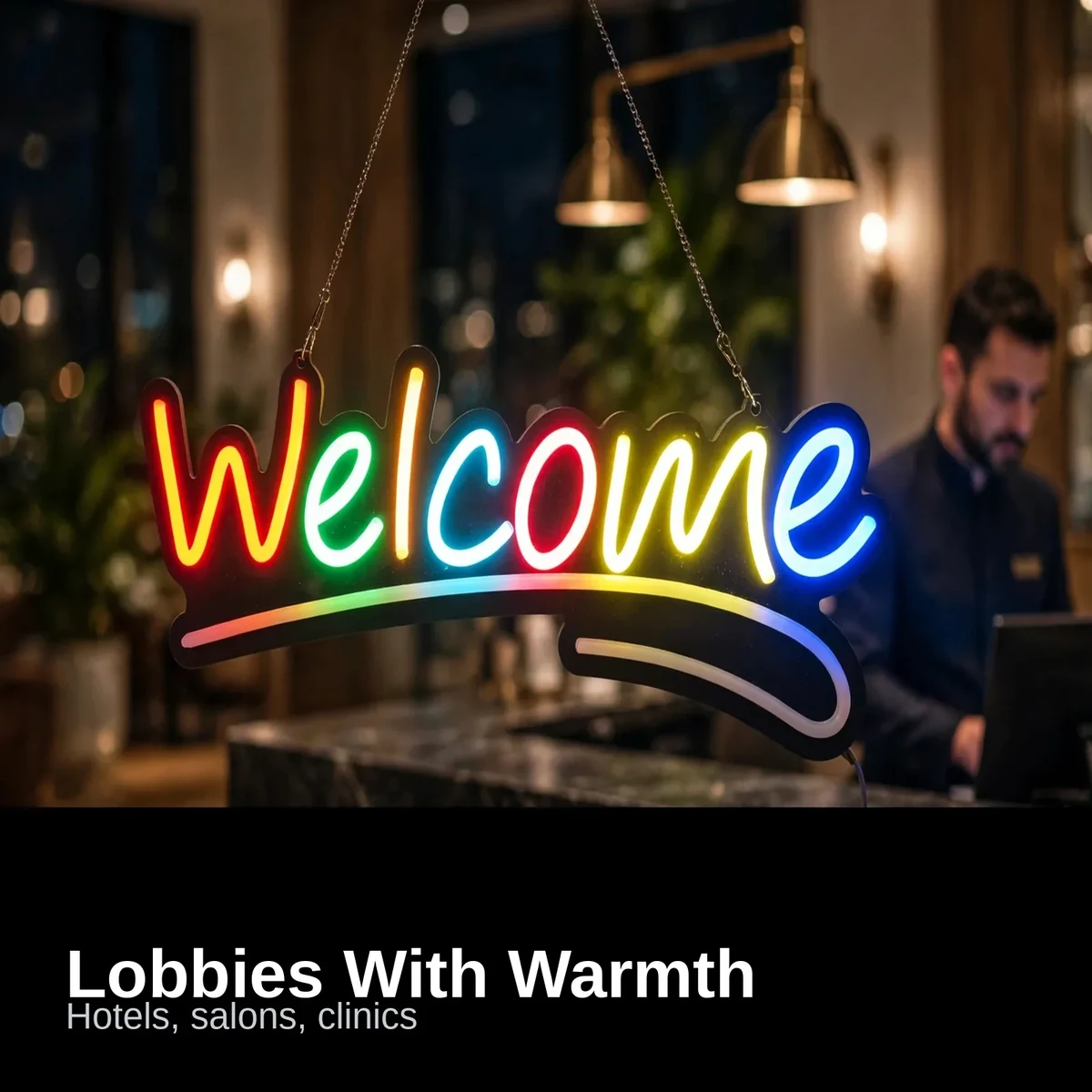 GearUP WELCOME neon sign glowing at a boutique hotel reception at night