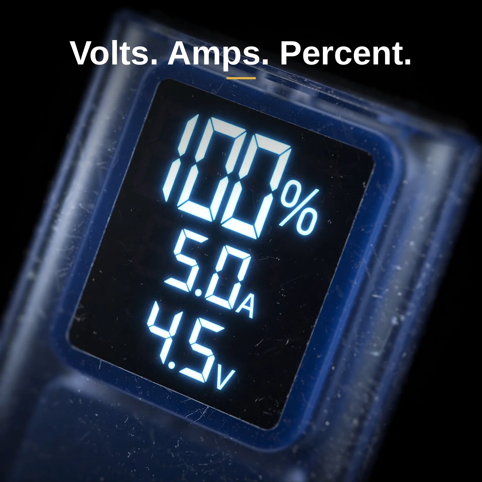Close-up of the Hoco J105 real-time LED digital display showing 100 percent charge level with live voltage and current readings