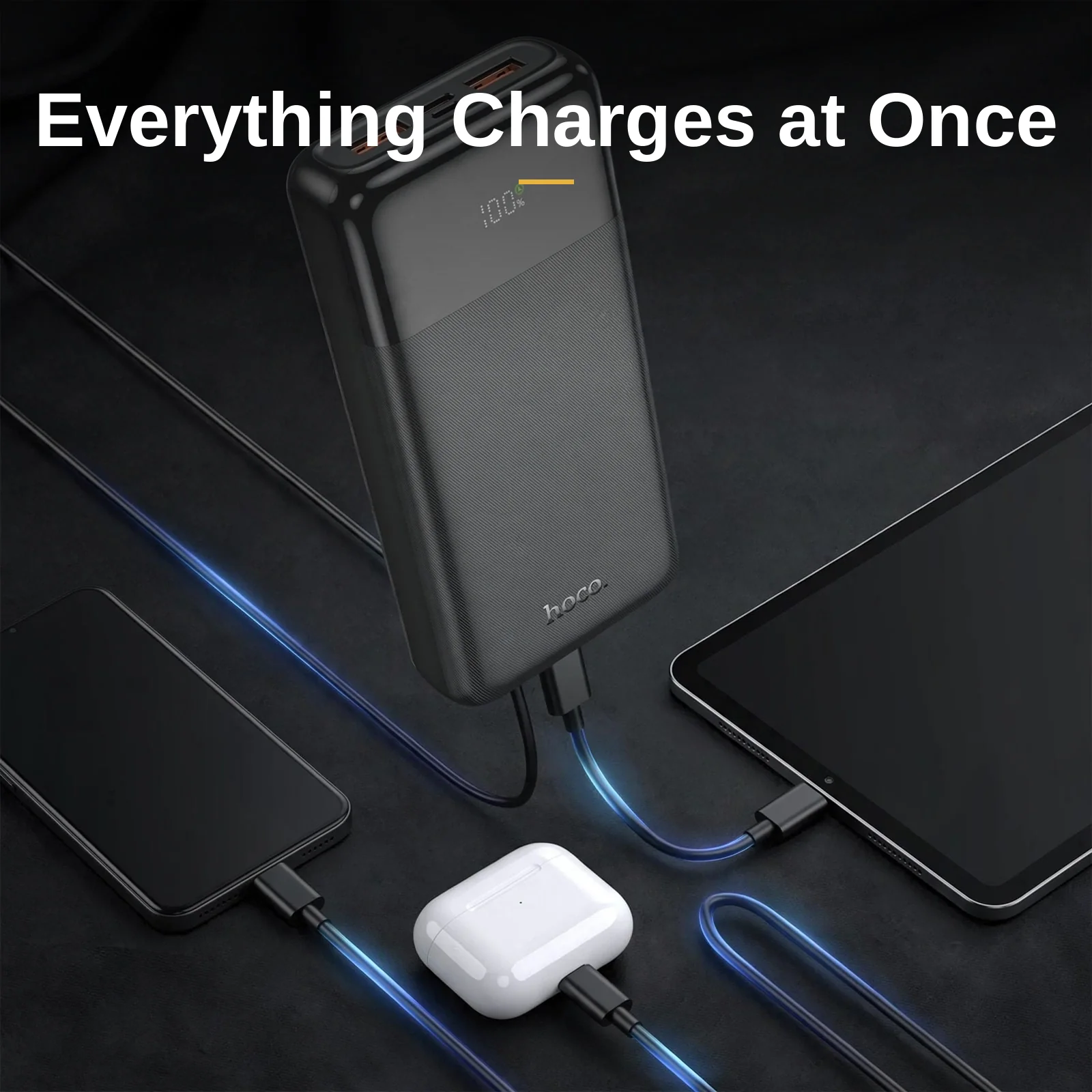 Hoco MMJ23 Resolute charging a phone, earbuds, and tablet at the same time (Hoco MMJ23 power bank price)