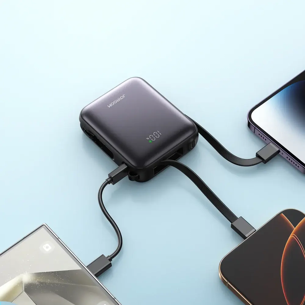 Joyroom JR-PBF27 power bank charging three phones at the same time with built-in cables