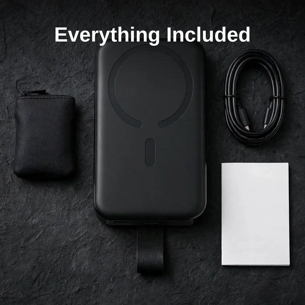 Joyroom JR-PBM11 box contents laid out with power bank, cable, storage bag and user manual