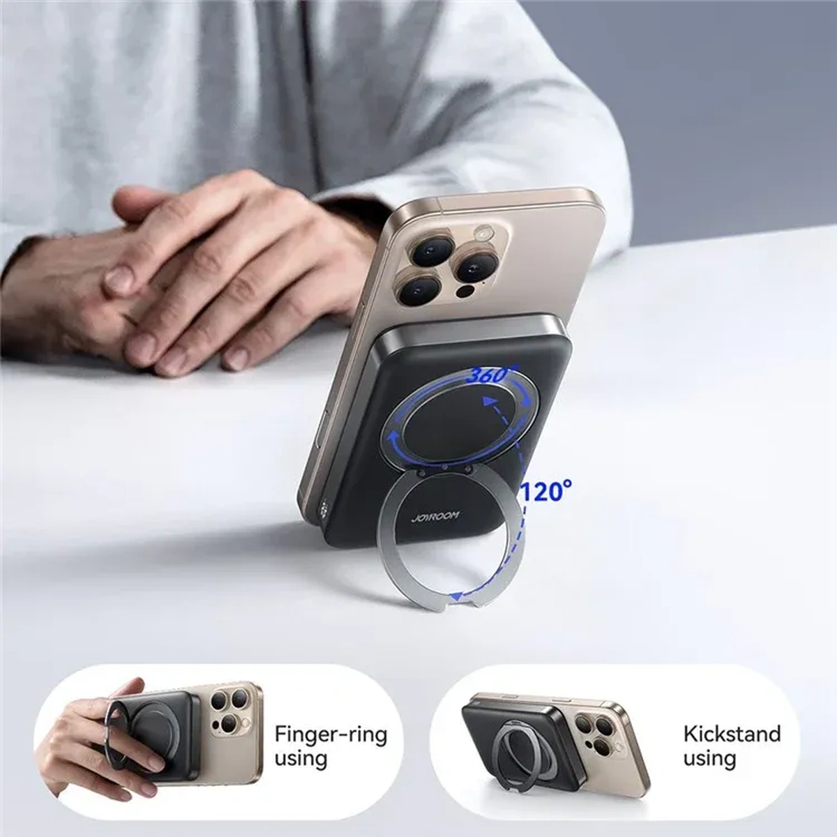 Joyroom JR-PBM12 with its rotating ring kickstand propping up a phone in portrait mode while it charges
