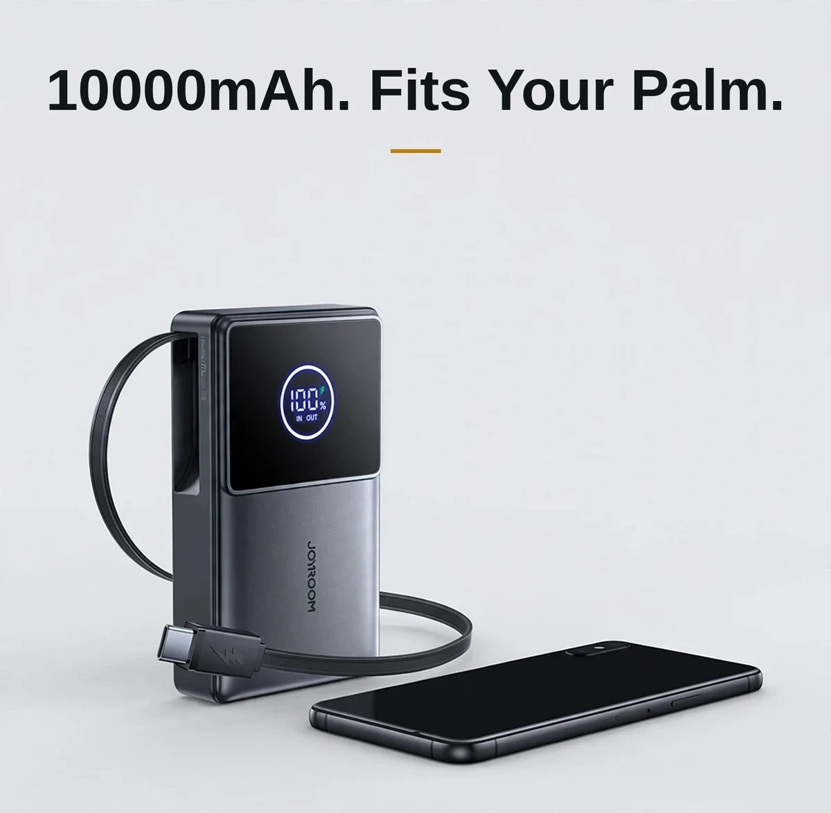 Joyroom JR-PR1 beside a smartphone, showing its compact 102mm pocketable size