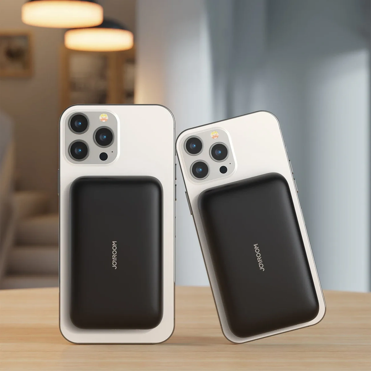 Joyroom JR-W020 power bank price in Bangladesh — Joyroom JR-W020 magnetic wireless mini power bank attached flush to the back of a phone