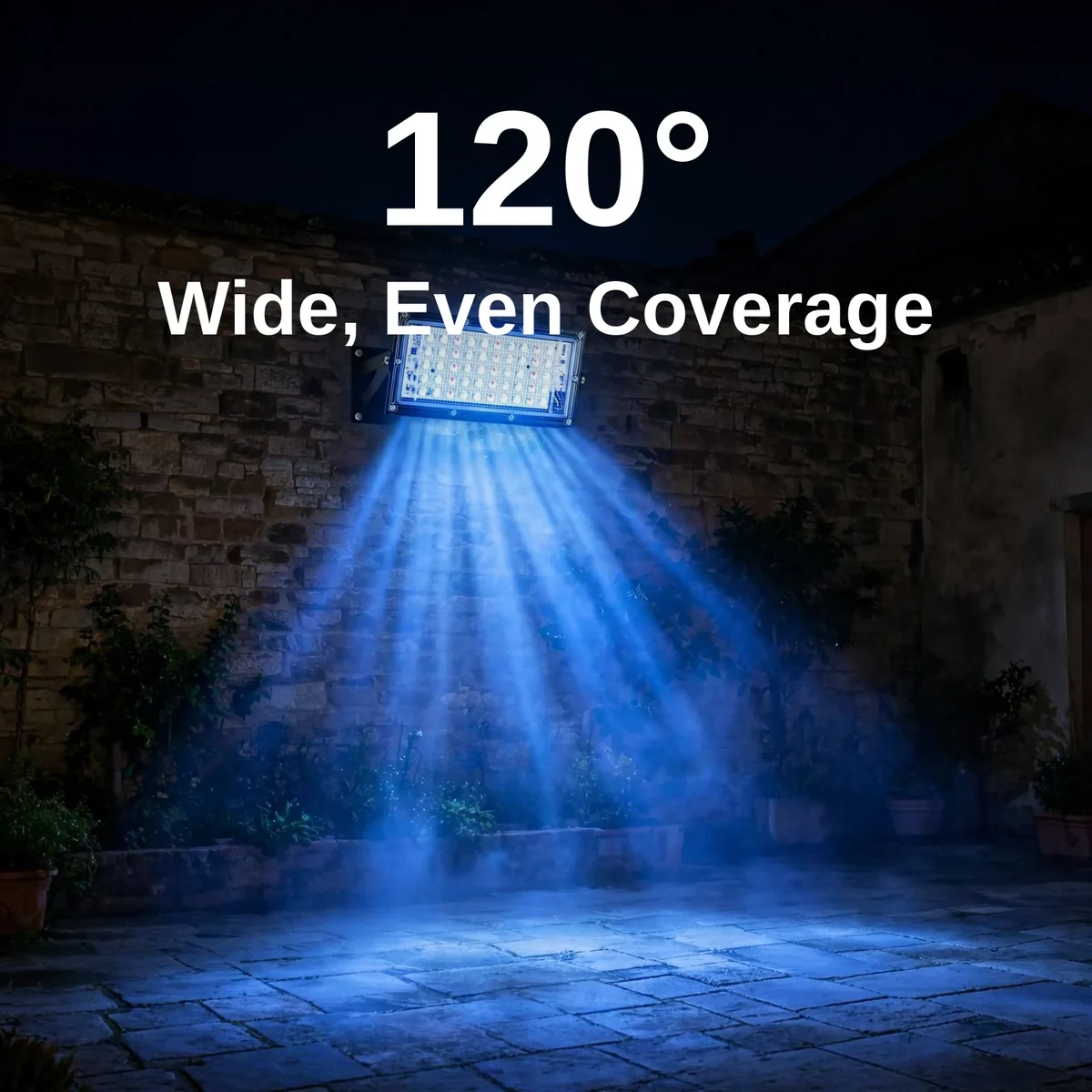 LED flood light 50W mounted on a wall bracket washing a courtyard with a wide beam
