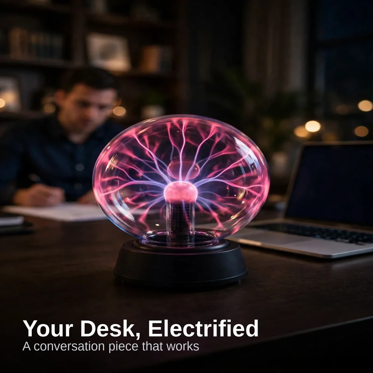 Plasma ball 5 inch glowing on a home office desk at night