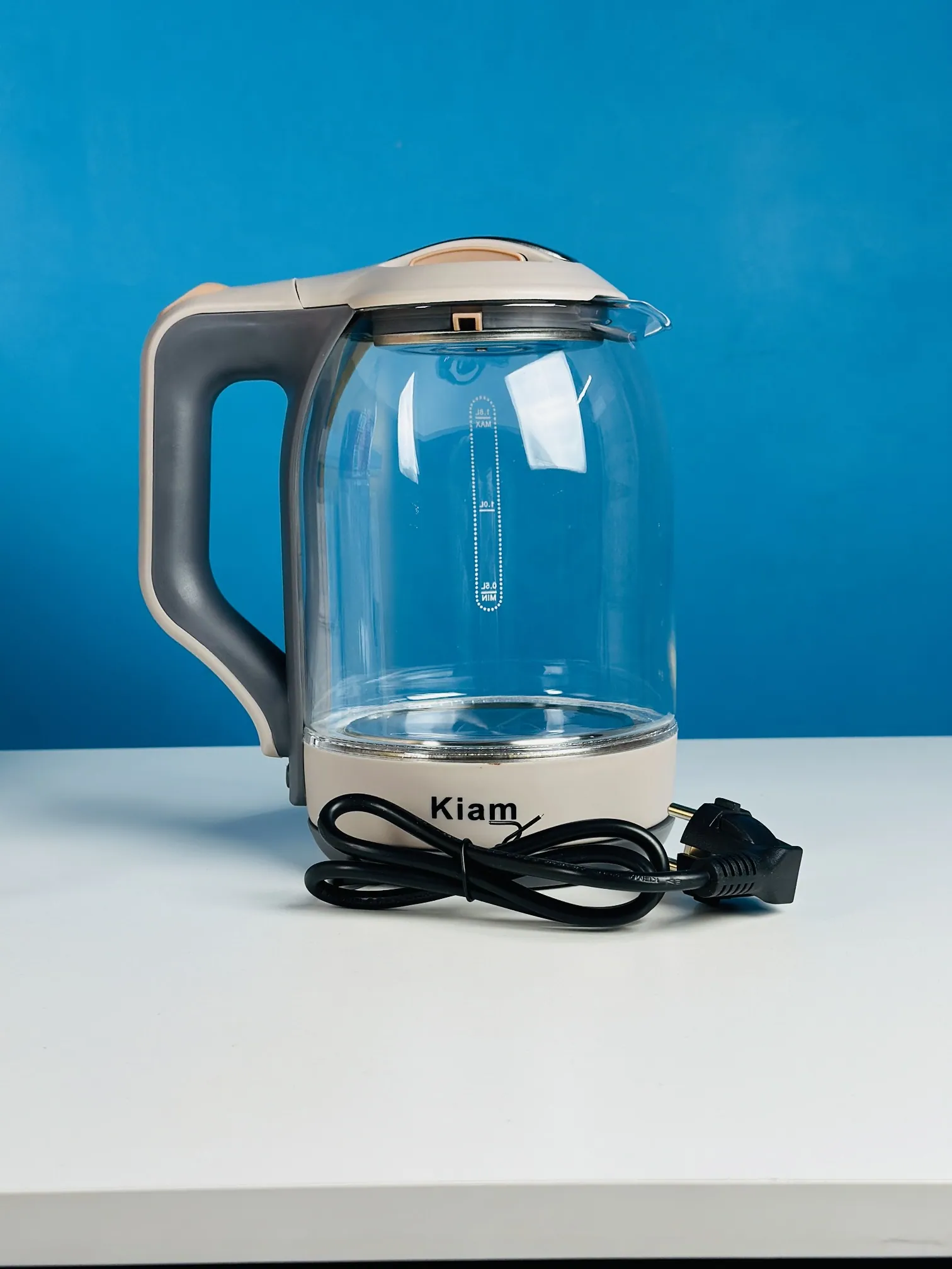 Kiam Electric Kettle BL002 Automatically turns Off - Automatic Over Heat Protection (1.8 L) Kiam BL002 1.8 L glass electric kettle on its power base