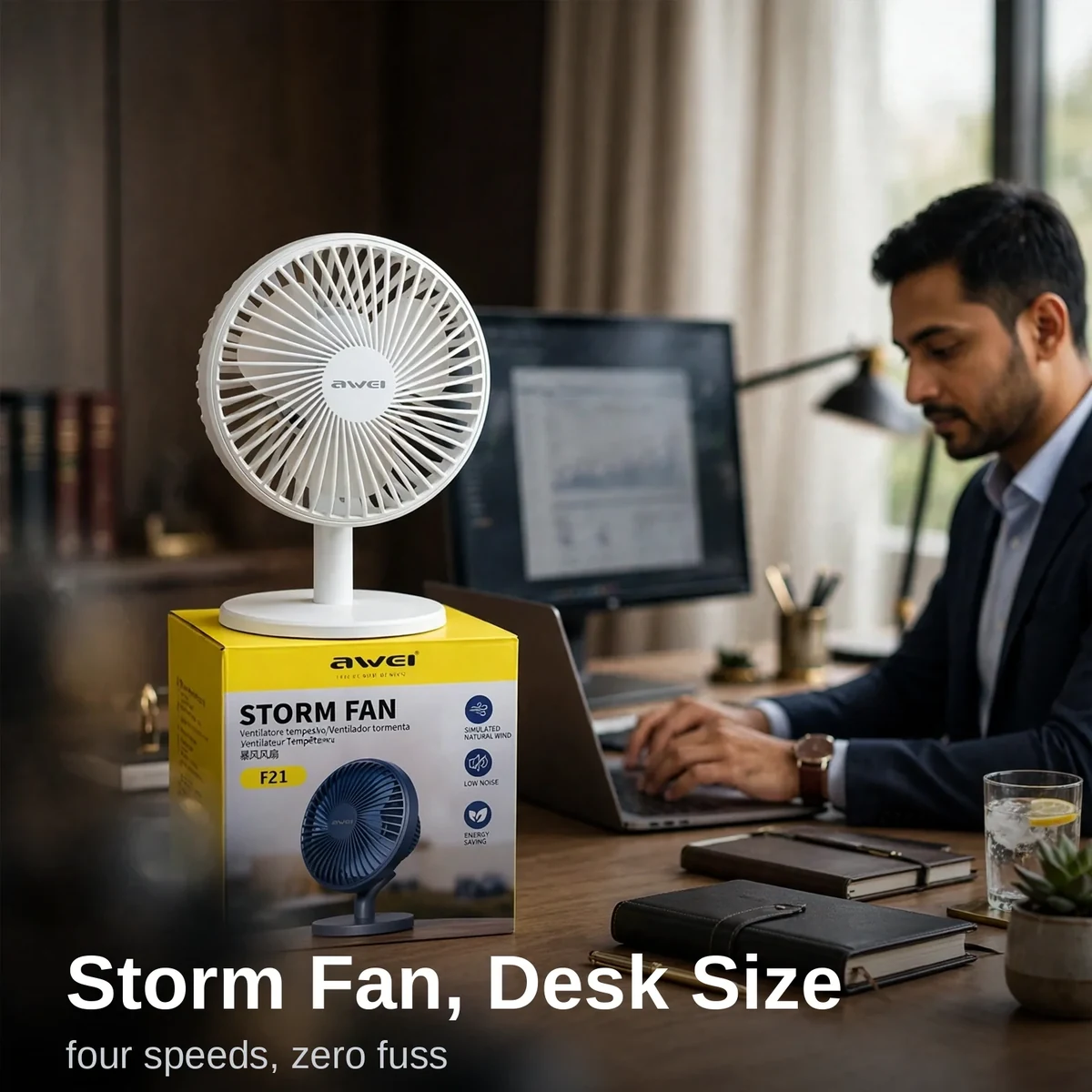 Awei F21 mini rechargeable fan in white on a desk