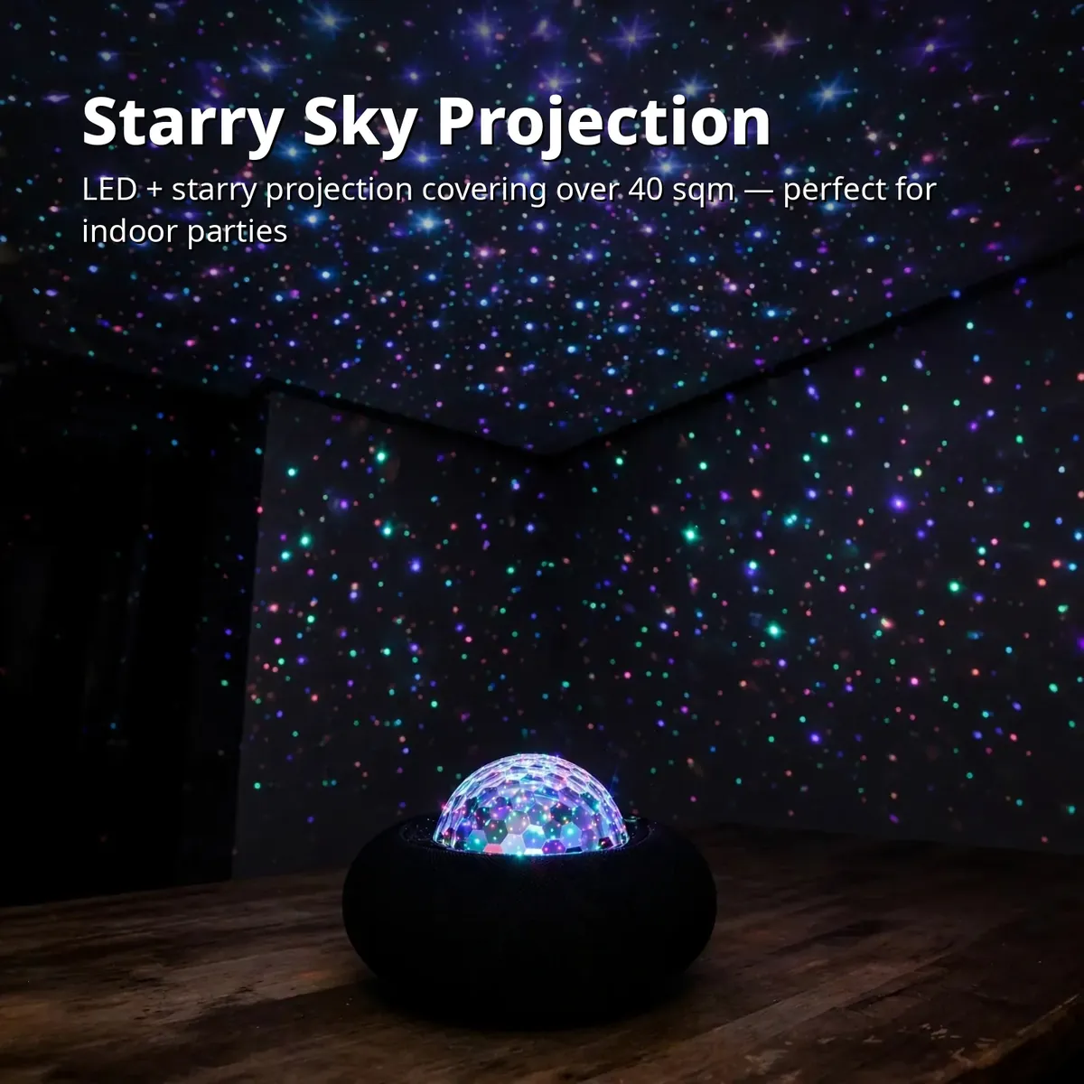 Joyroom JR-MS02 Maya RGB speaker projecting a starry sky over a dark room