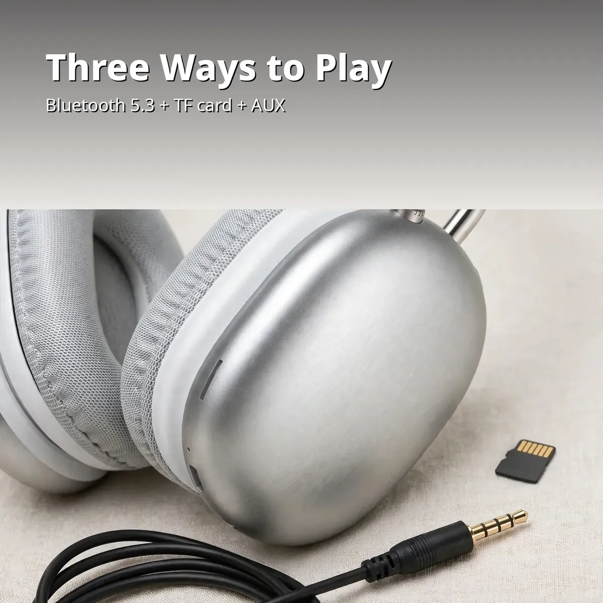 Hoco W35 Max multimode feature card — silver headphone earcup with a TF card and AUX cable. Three Ways to Play. Bluetooth 5.3, TF card, AUX.