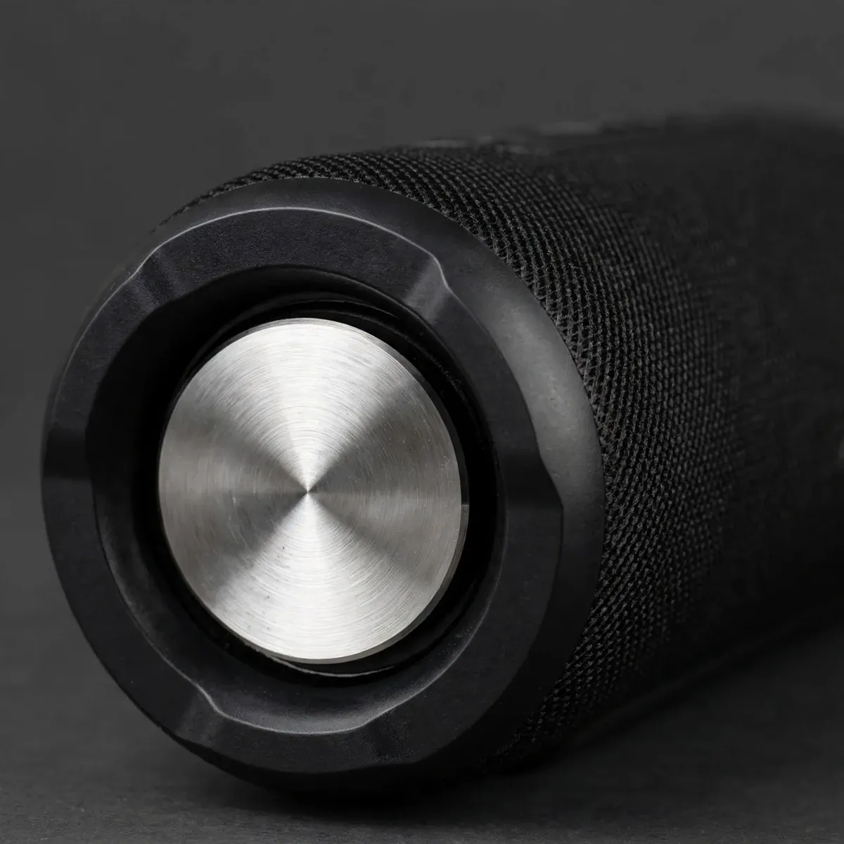 Macro detail of the Hoco DS100 exposed metallic passive bass radiator cone