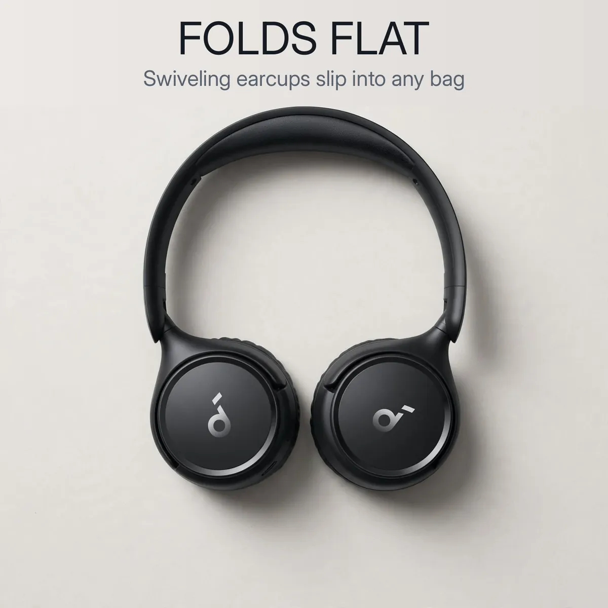 Anker Soundcore H30i folded flat on a light background — Folds Flat. Swiveling earcups slip into any bag.