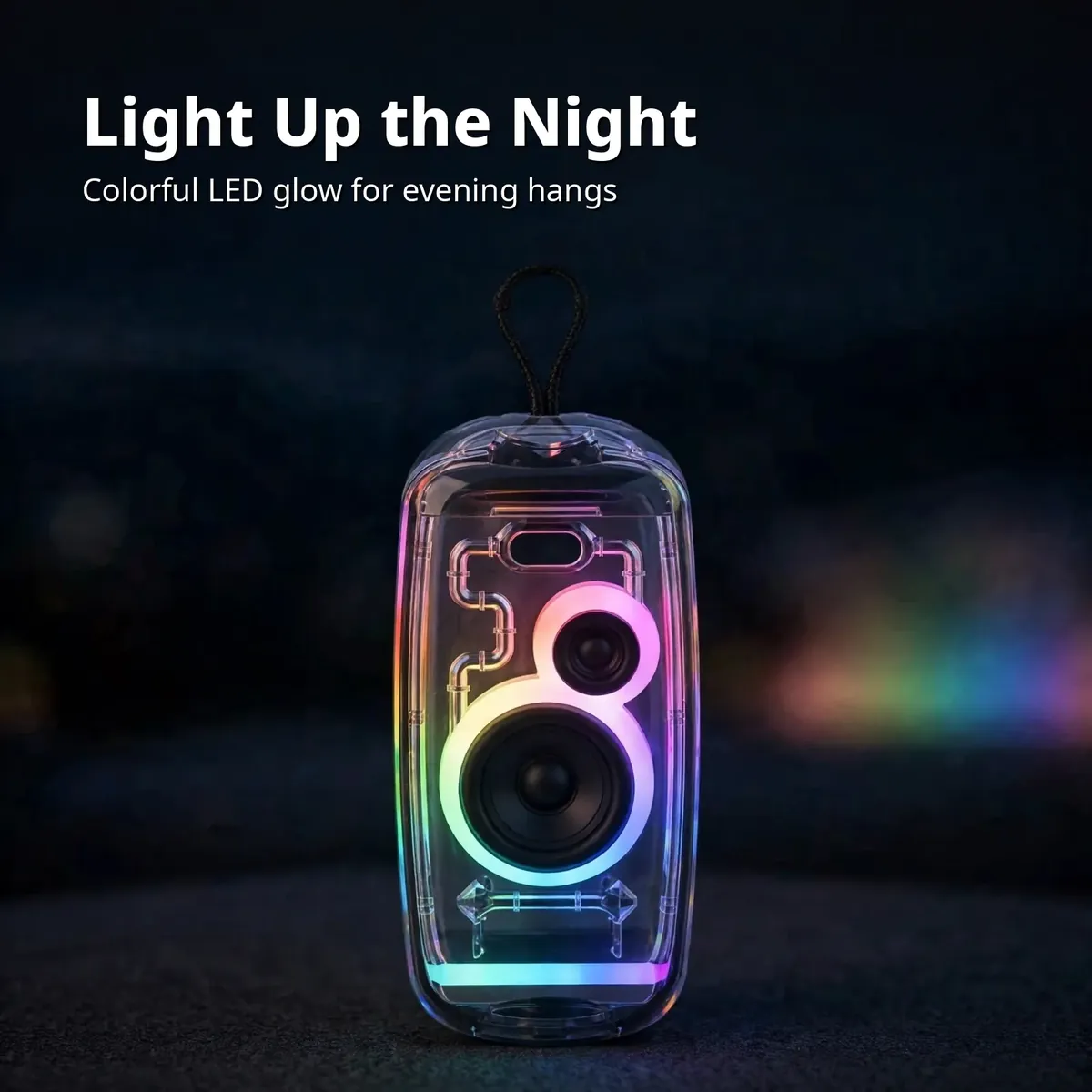 Awei KA32 RGB card showing the transparent speaker glowing with colorful LED light in a dim room