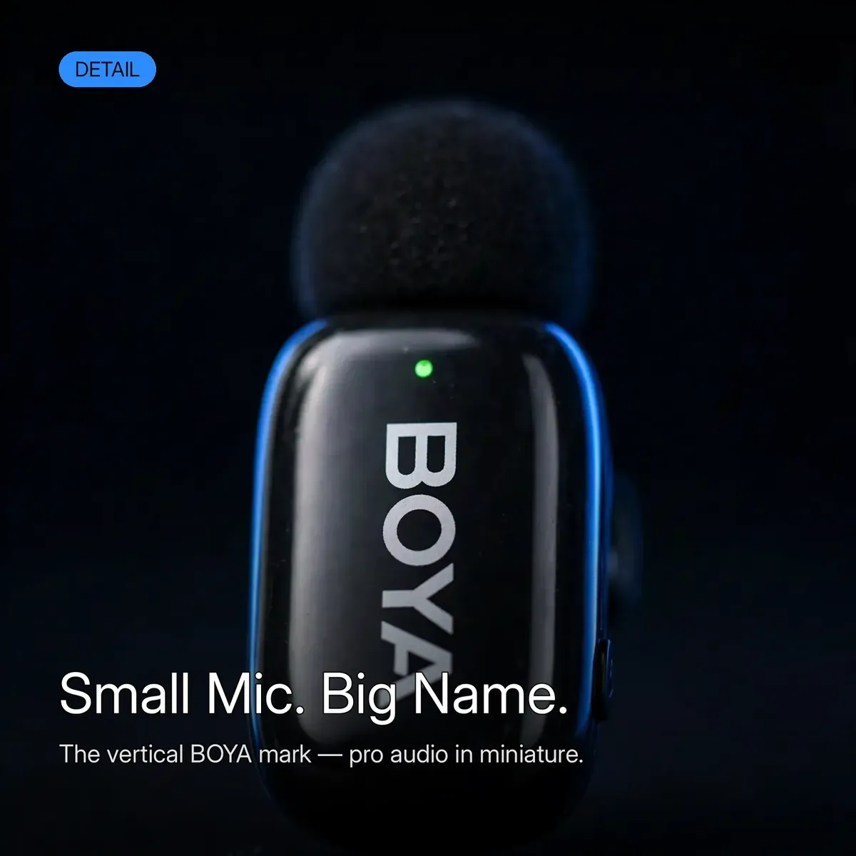 BOYA Mini-16 macro detail of the vertical BOYA logo on the transmitter — Small Mic. Big Name. The vertical BOYA mark, pro audio in miniature.