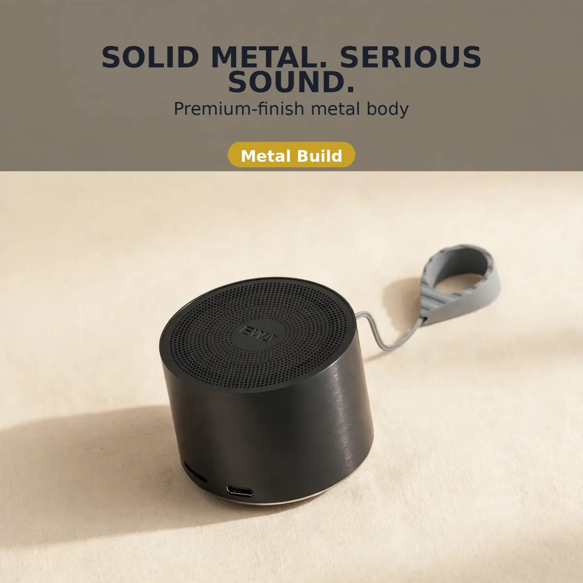 EWA A129 metal card showing the black metal speaker body with lanyard under the Solid Metal Serious Sound headline