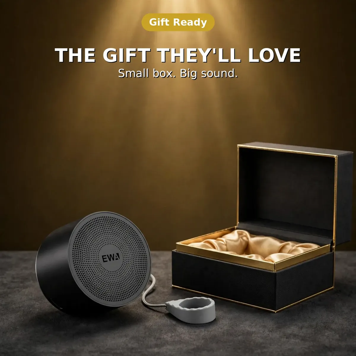 EWA A129 gift card with the speaker beside a gift box under The Gift They'll Love