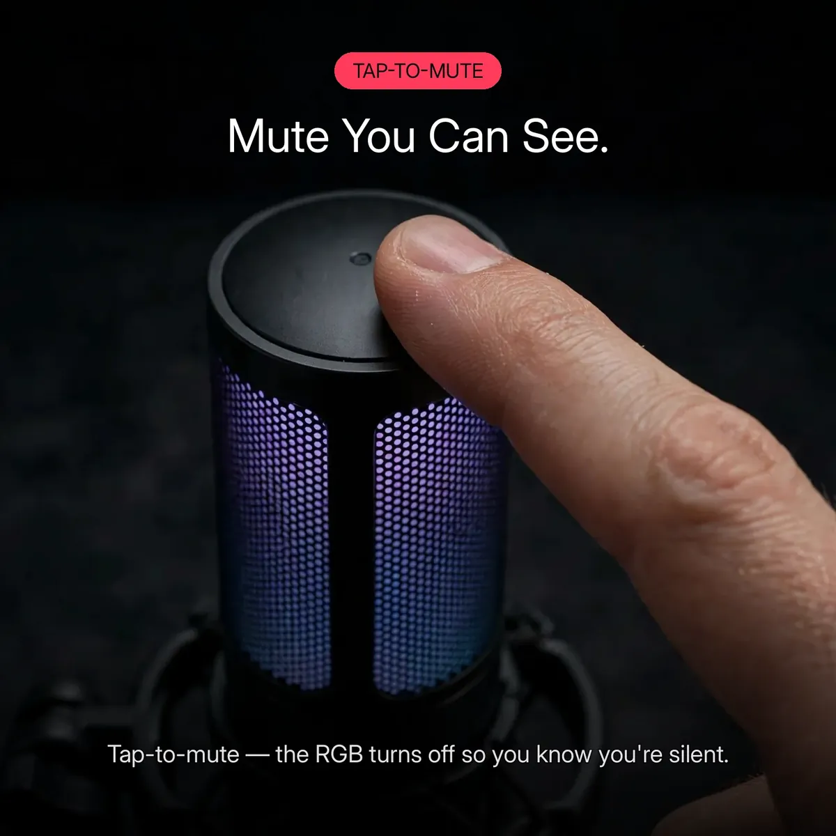 FIFINE AmpliGame A6T close-up of a fingertip tapping the top of the microphone — Mute You Can See. Tap-to-mute, the RGB turns off so you know you're silent.