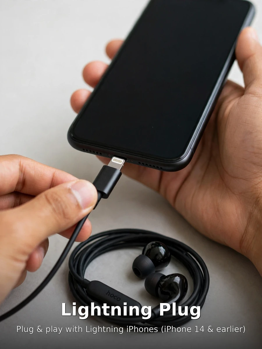 Hand inserting the Hoco M116 Lightning plug into an iPhone port — plug and play with Lightning iPhones, iPhone 14 and earlier