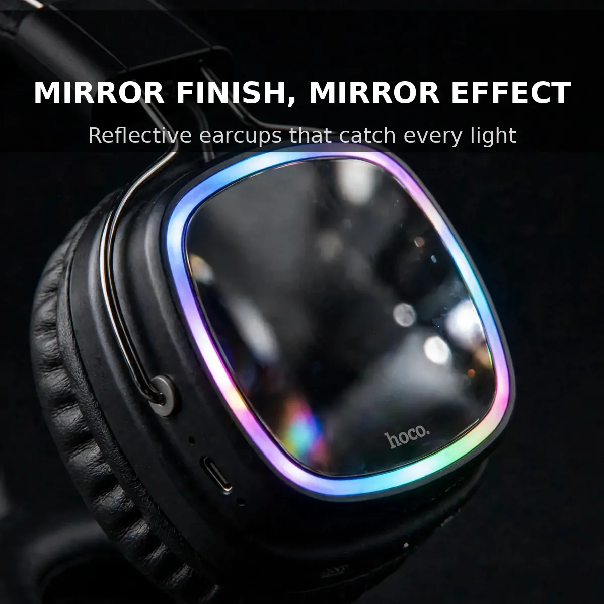 Hoco W72 mirror-finish earcup macro — Mirror Finish, Mirror Effect. Reflective earcups that catch every light.