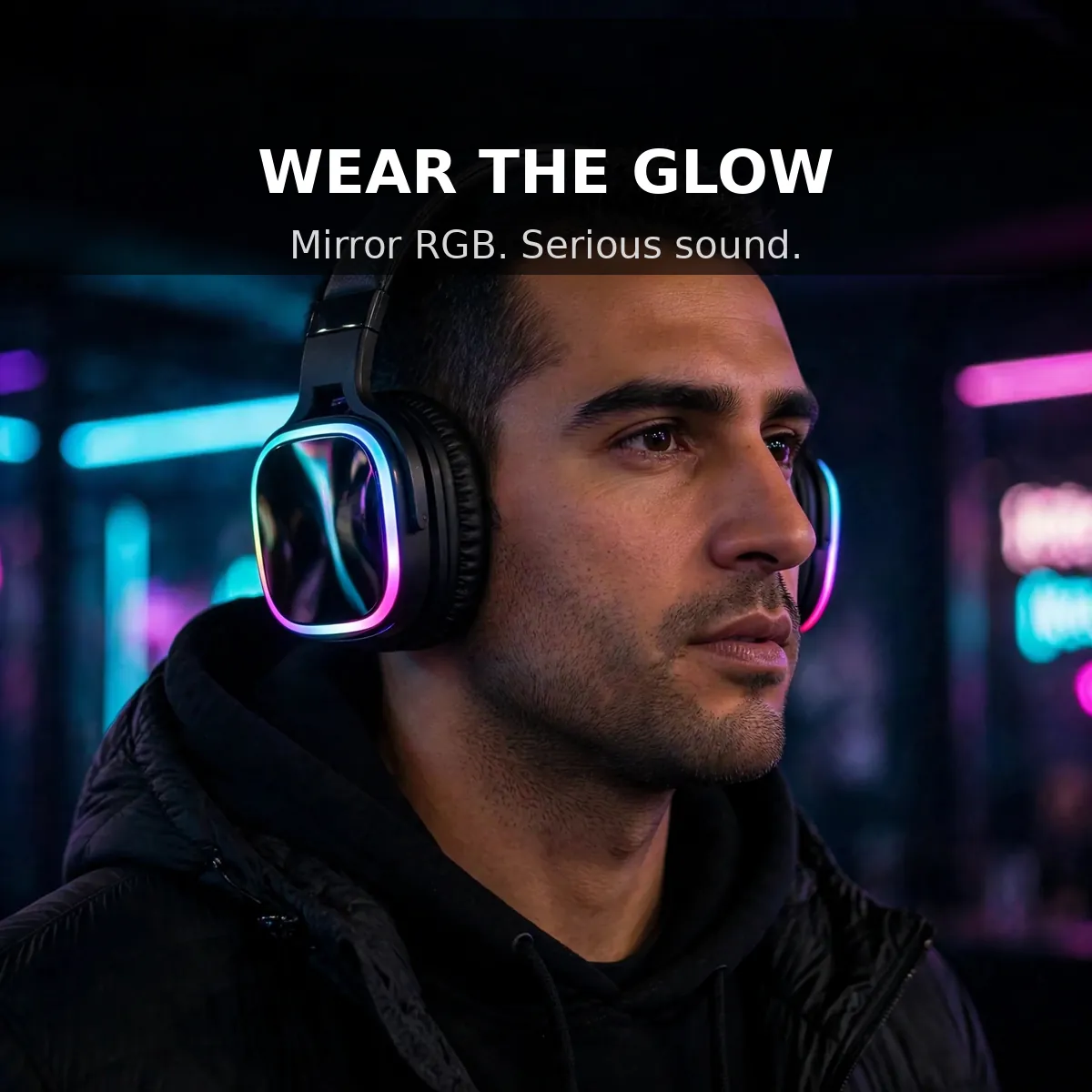 Hoco W72 promo portrait of a man wearing the headphones in a neon-lit room — Wear the Glow. Mirror RGB. Serious sound.