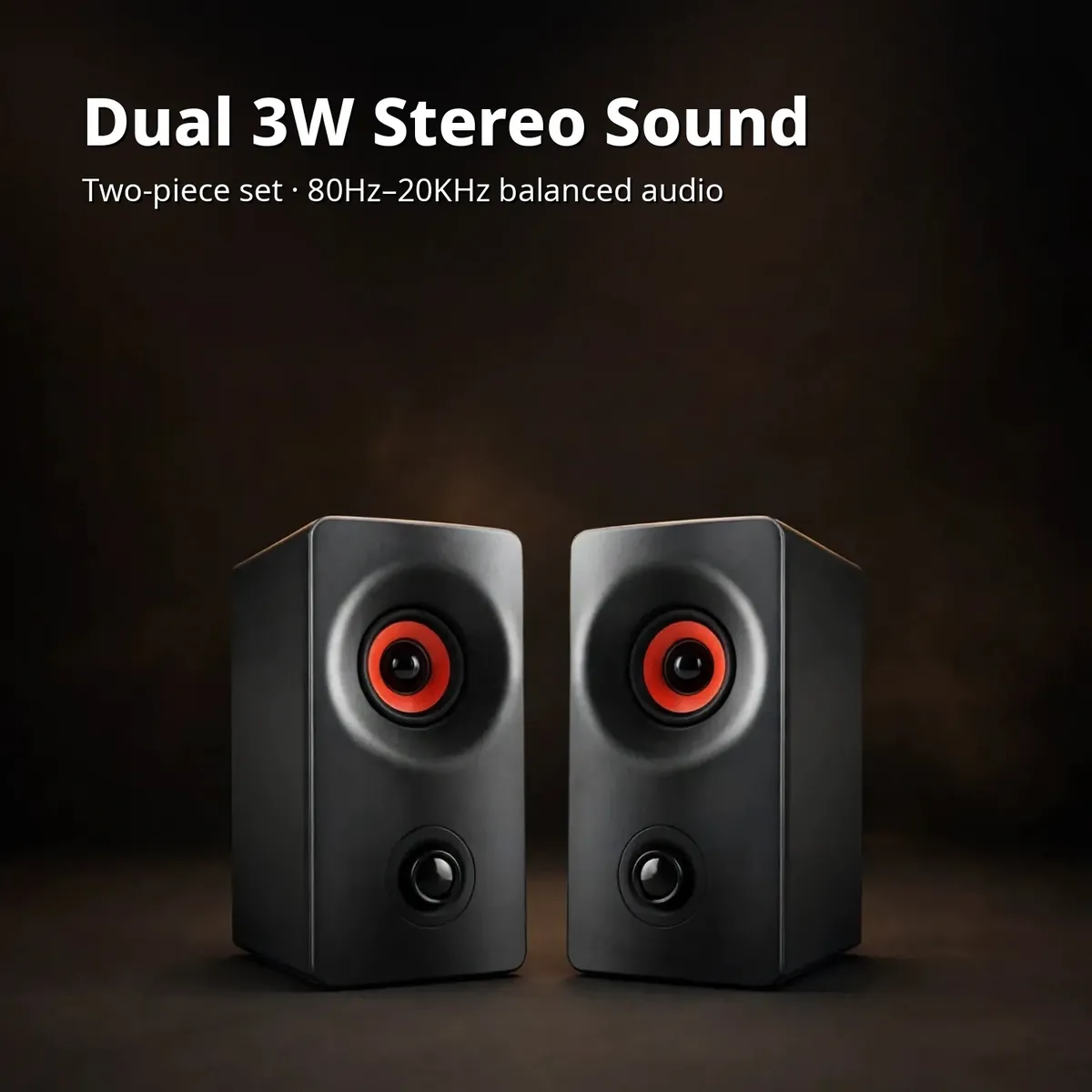 Kisonli AC-9002BT dual 3W stereo card showing the black tower speaker pair with red driver rings on a warm studio backdrop