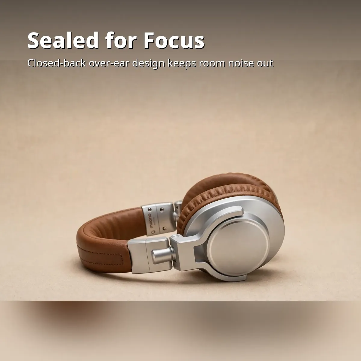 MAONO MH700 Brown isolation card showing the brown headphone folded flat on a warm beige backdrop — Sealed for Focus. Closed-back over-ear design keeps room noise out.