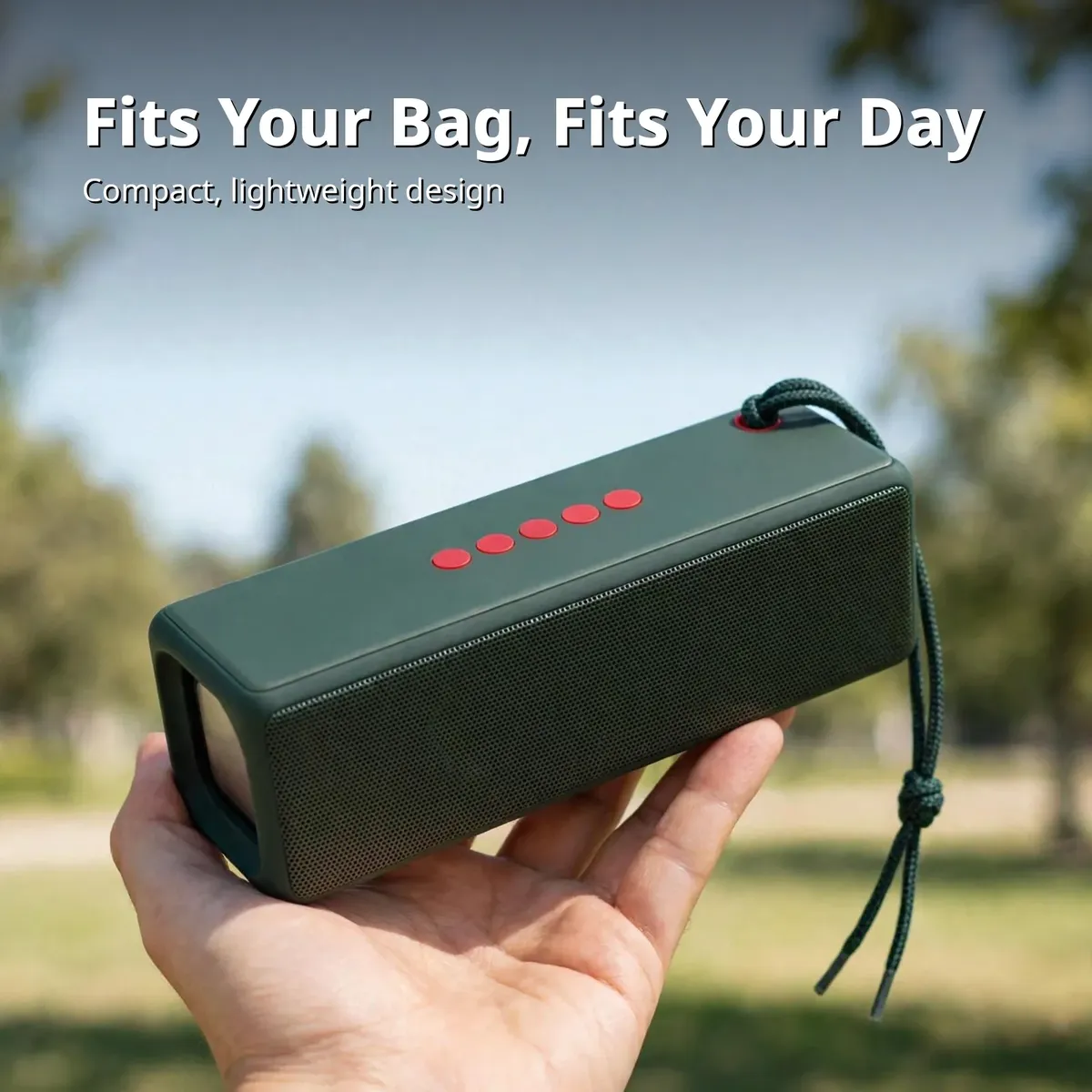MKB SP4 portable card showing the green speaker held in a hand outdoors