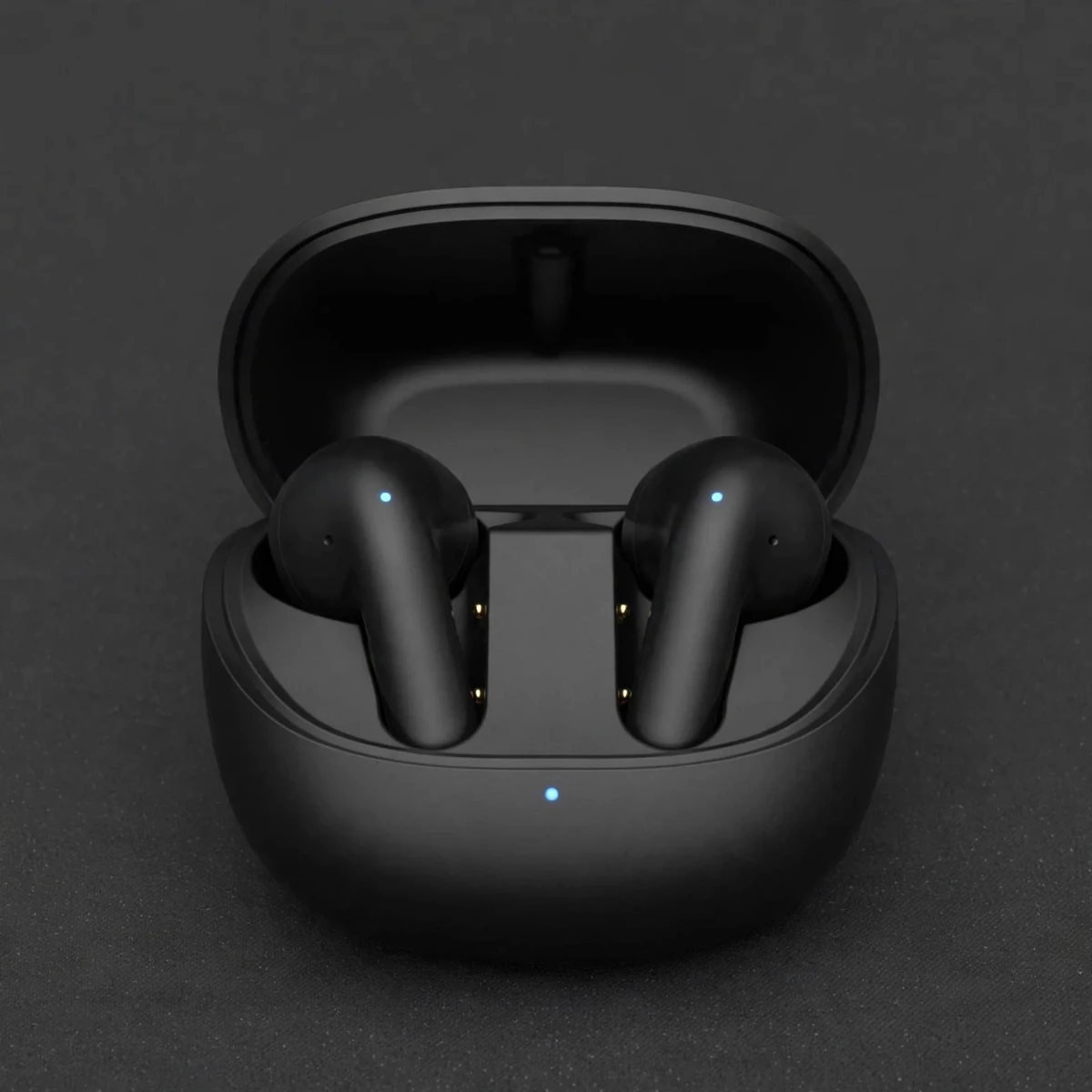 Close-up of the Proove Logic charging case with earbuds seated, gold pins and blue LED visible